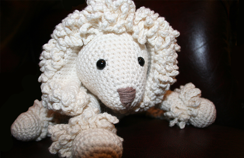 crochet poodle on a couch