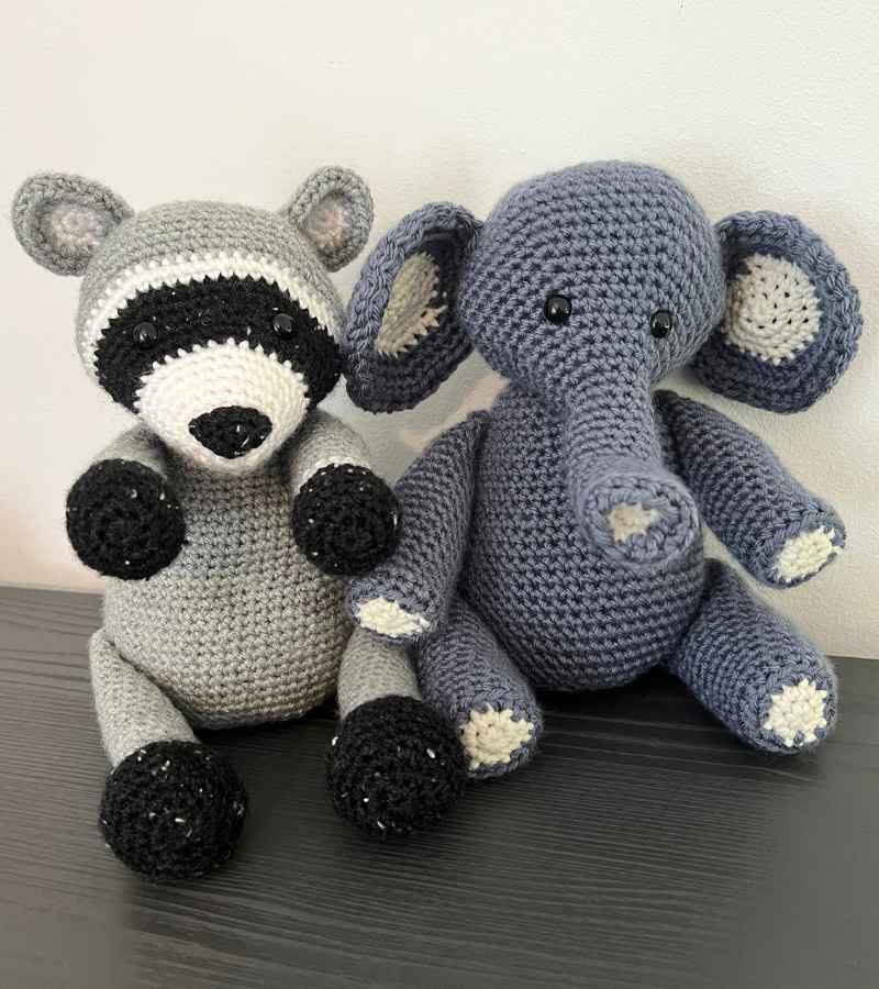 crochet elephant and crochet raccoon