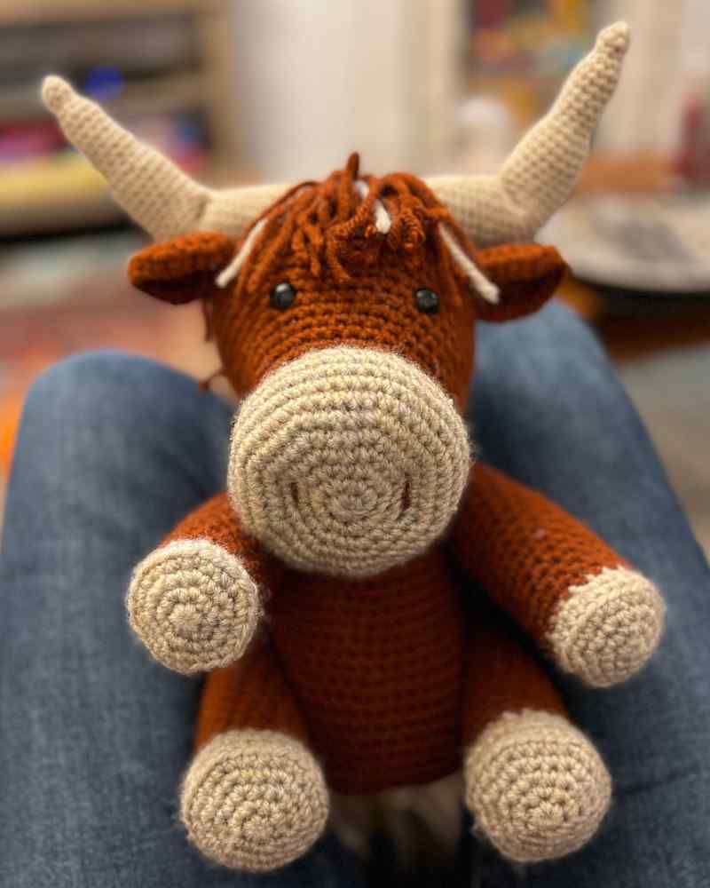 crocheting the cow arms and legs