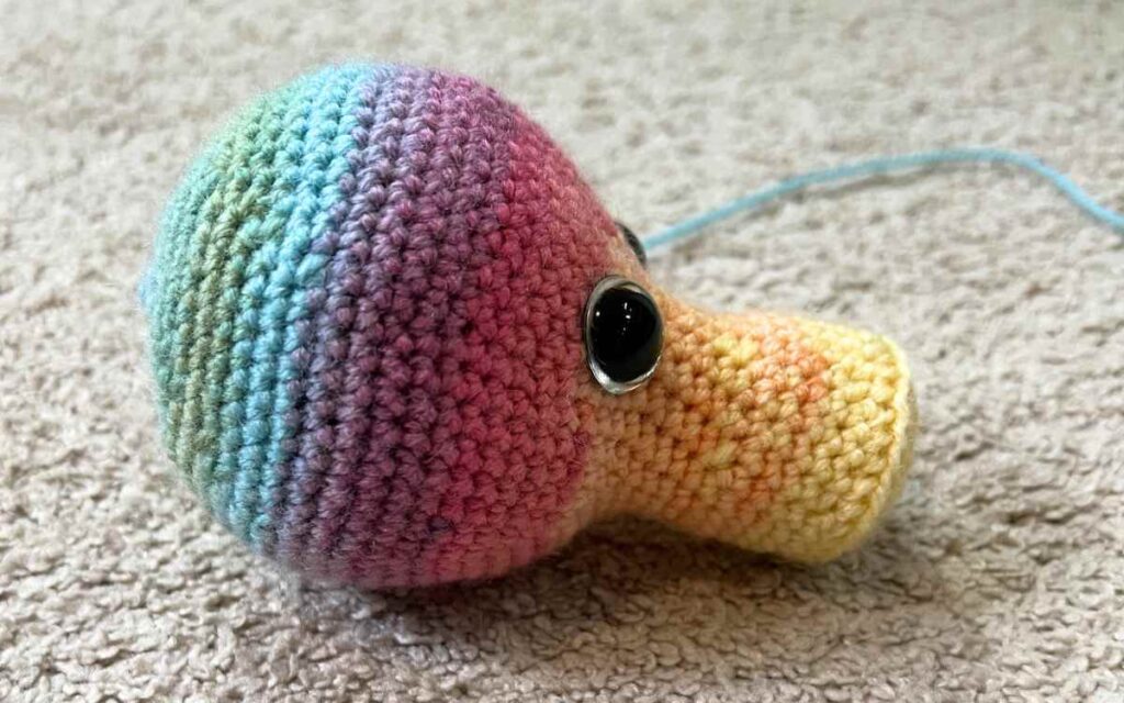 crochet rainbow dragon head