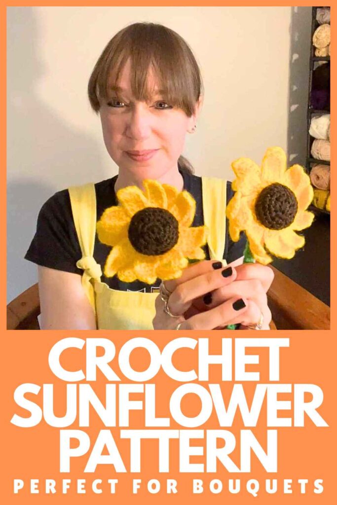 photo of a young woman holding two crochet sunflowers