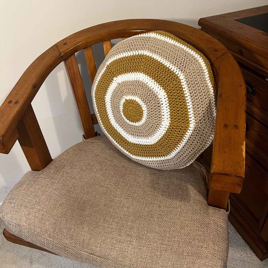 photo of the round pillow on a chair