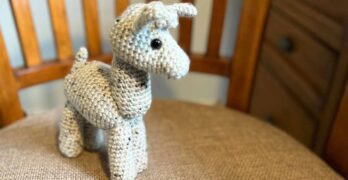 photo of a crochet llama amigurumi toy