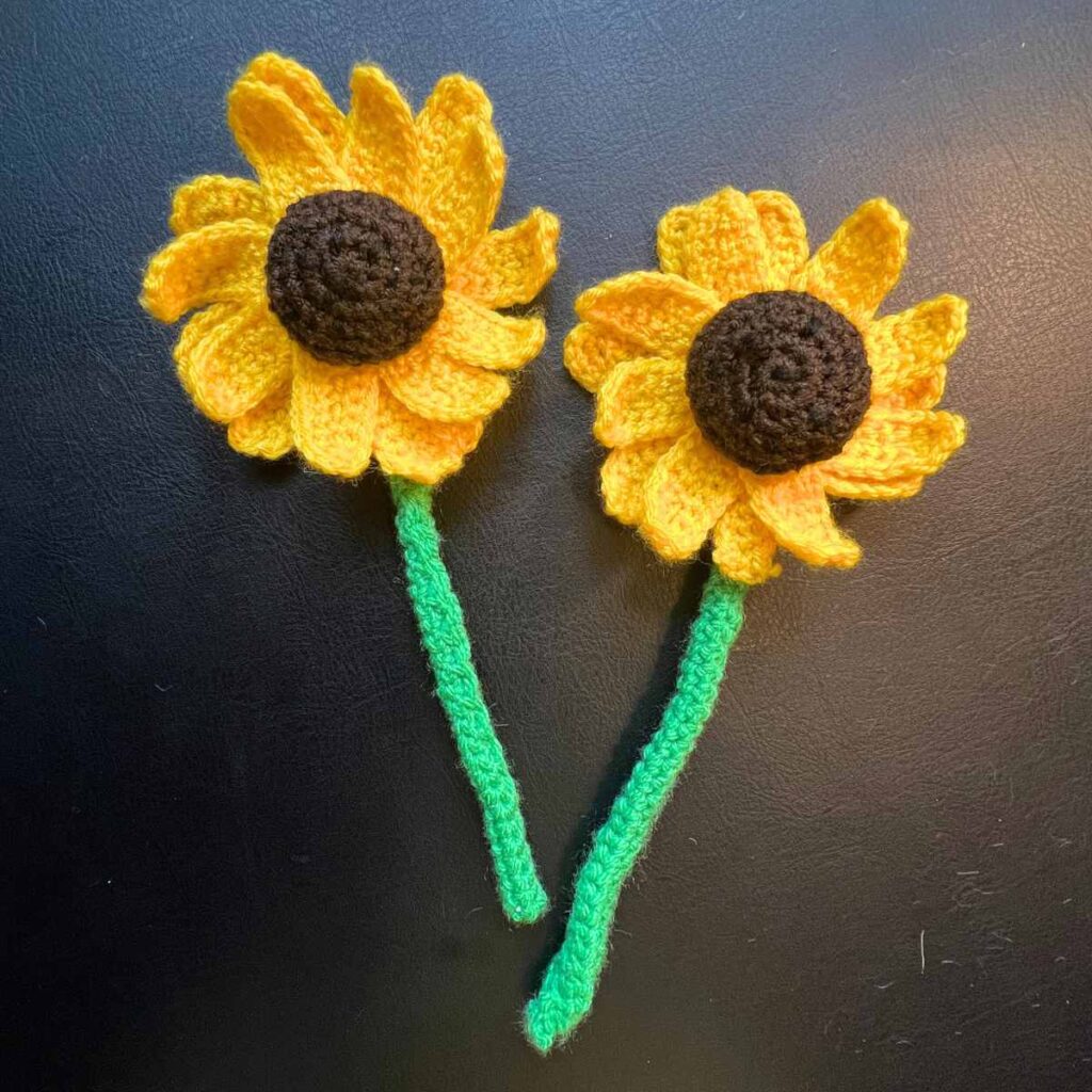 photo of two crocheted sunflowers