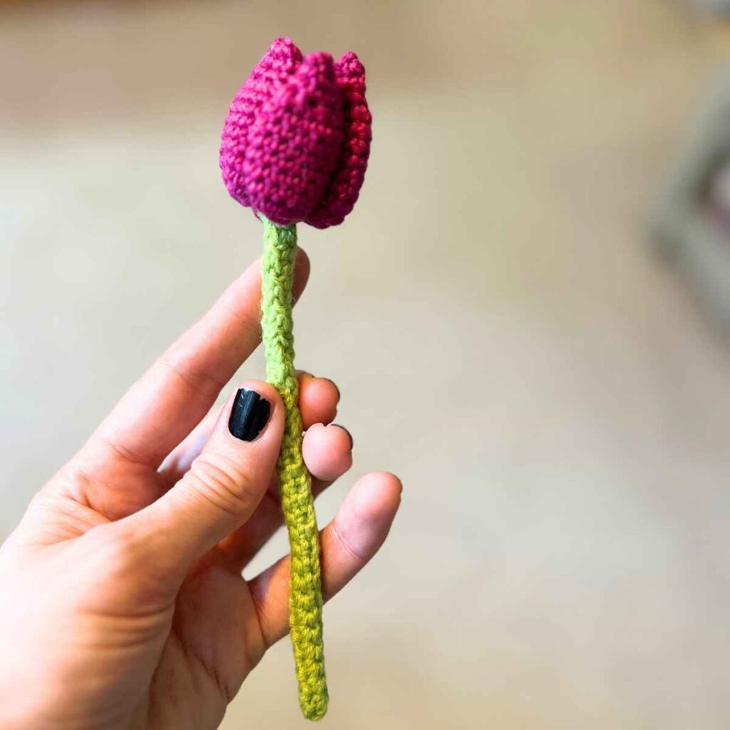 image showing a single crocheted pink tulip
