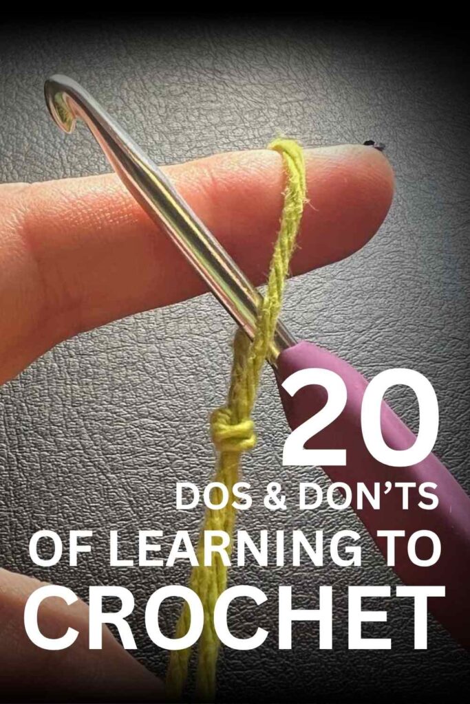 photo of a hand with crochet hook and green yarn