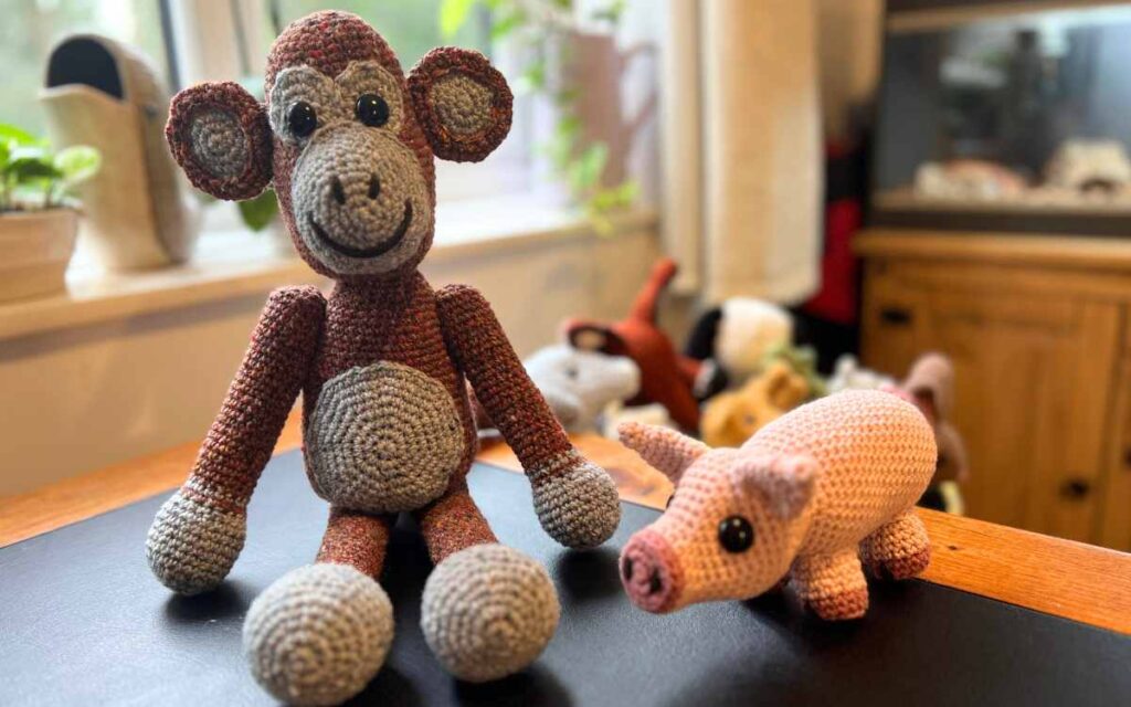 image showing my crochet monkey and piglet