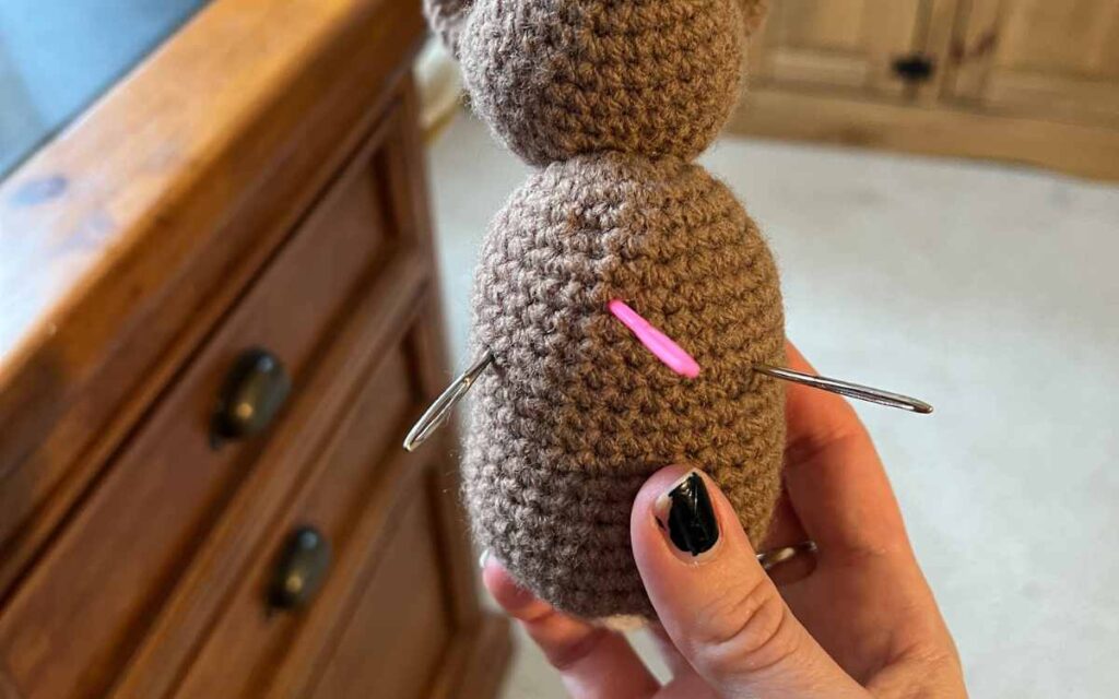 photo showing how to mark leg positions on amigurumi