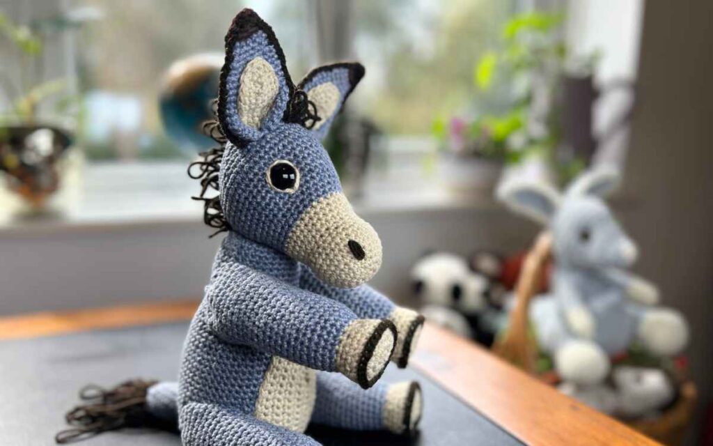 image of the crochet donkey sitting on my desk
