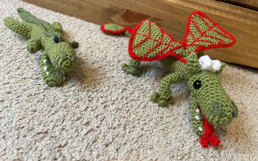 image showing the crochet dragon and croc