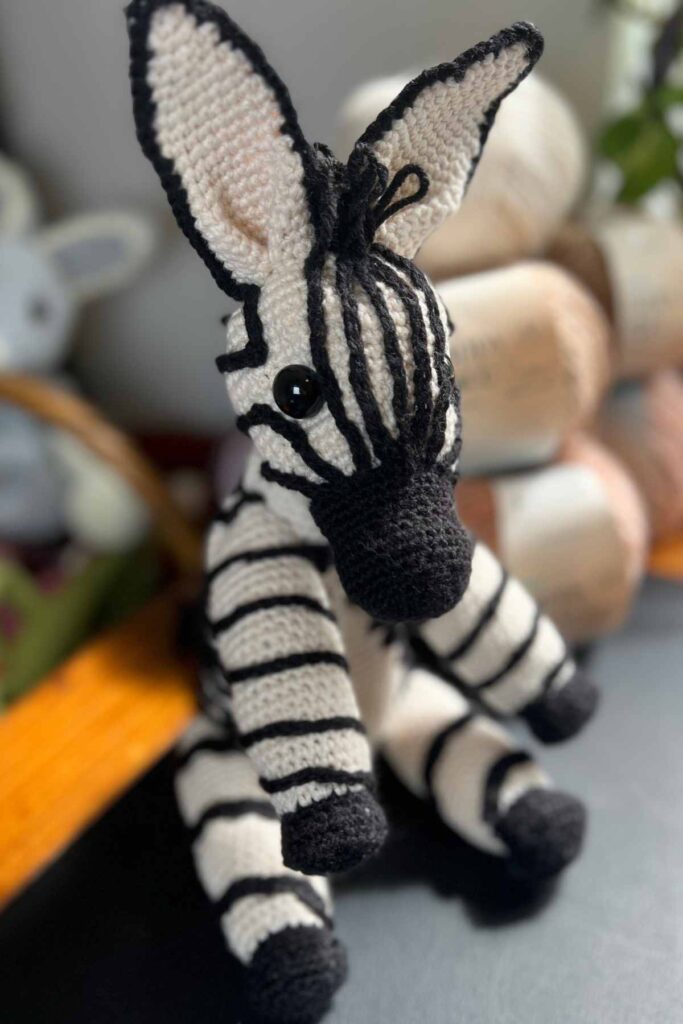 image of crochet zebra focussing on the head