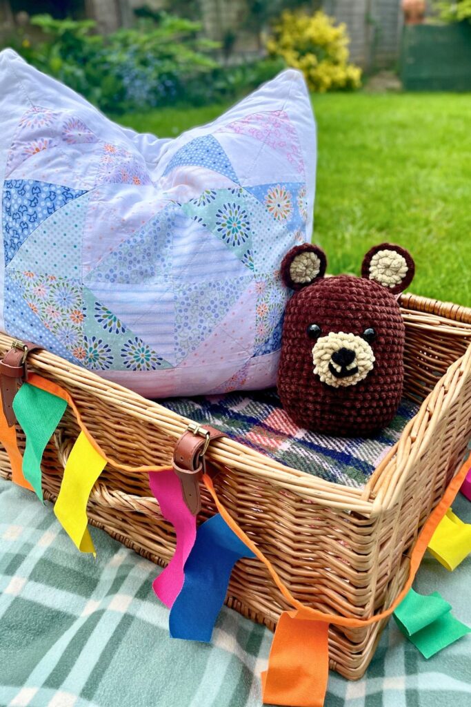 photo of the finished bear in a picnic basket
