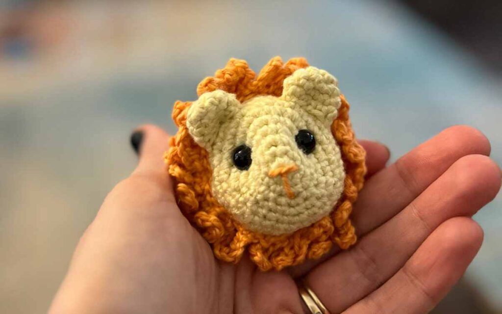 picture of my amigurumi lion keychain face on