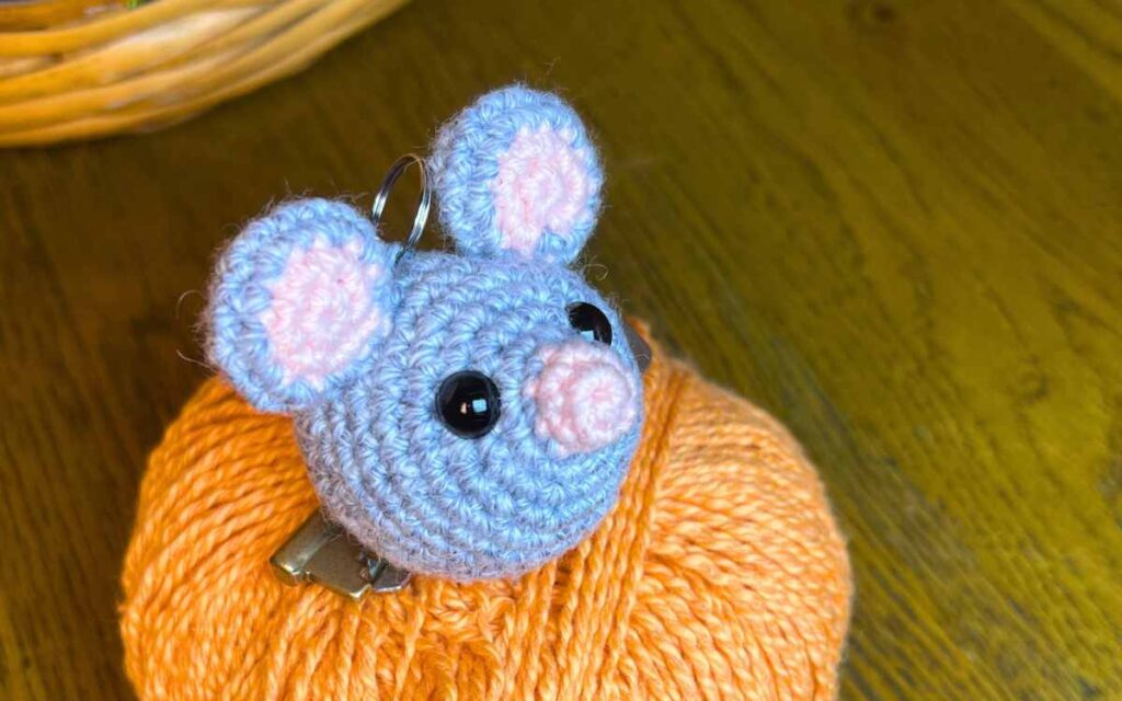 image of my crochet mouse keychain on yarn