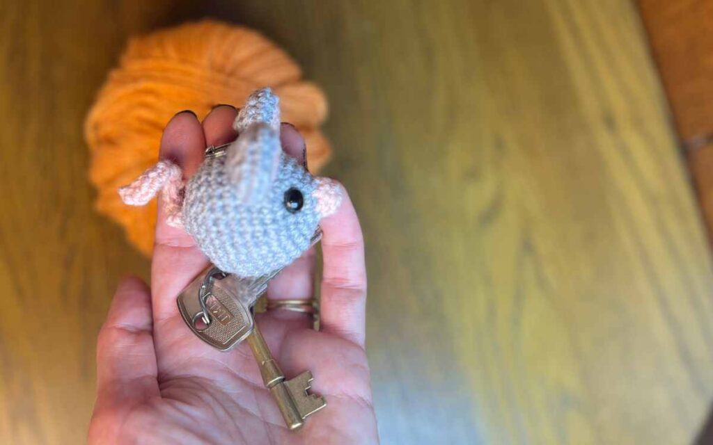 image of my crochet mouse keychain from the side