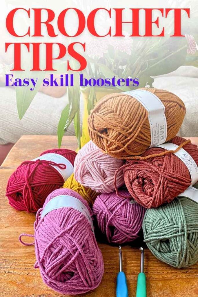 photo of yarn and crochet hooks