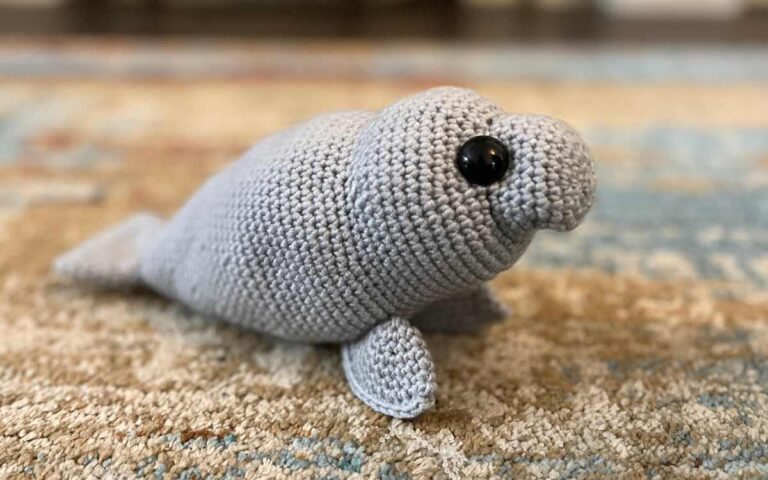 my crochet manatee on the rug