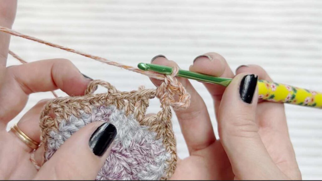 A side angle view of how I hold my crochet hook