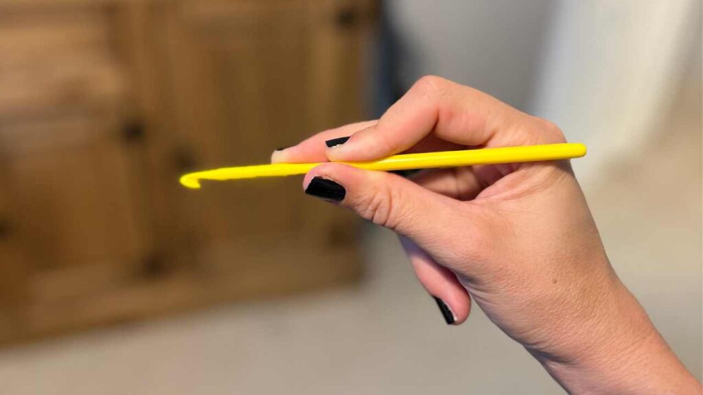 photo of me demonstrating pencil grip