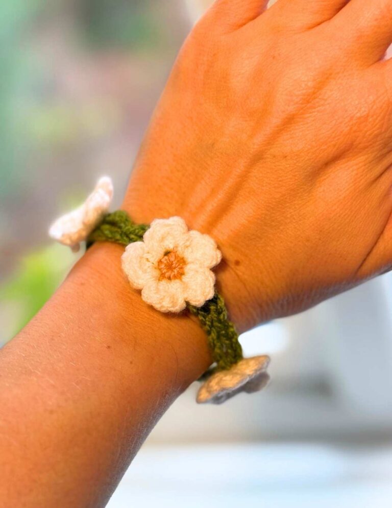 daisy crochet bracelet on my wrist