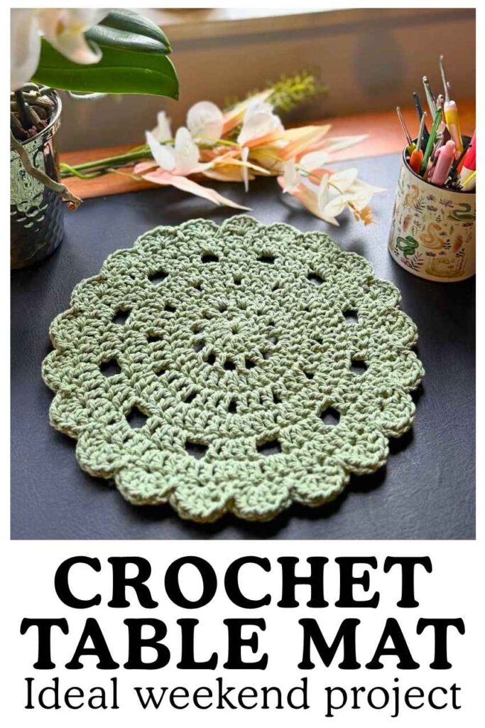 photo of a round crochet table mat in moss green yarn