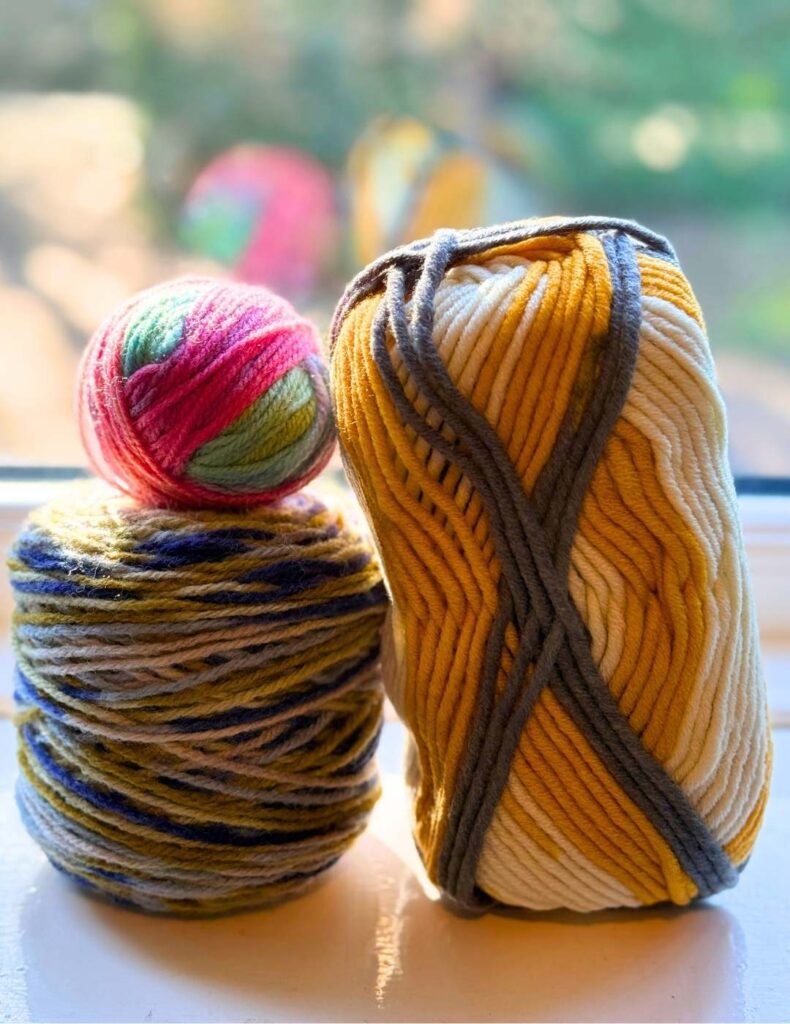 three variegated yarns in a stack