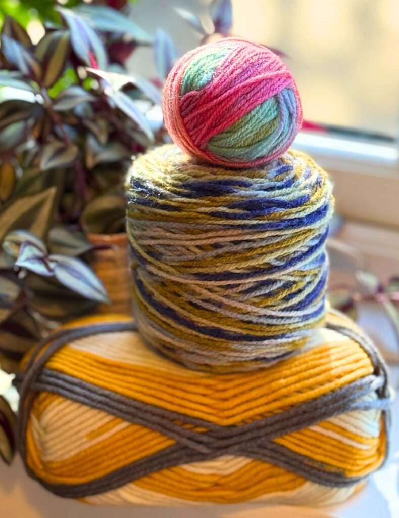 three variegated yarns in a stack