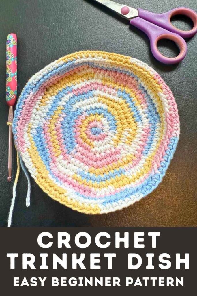 photo of a crochet trinket dish made from variegated pink yarn
