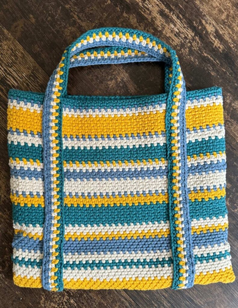 my crochet beach bag on the wooden floor