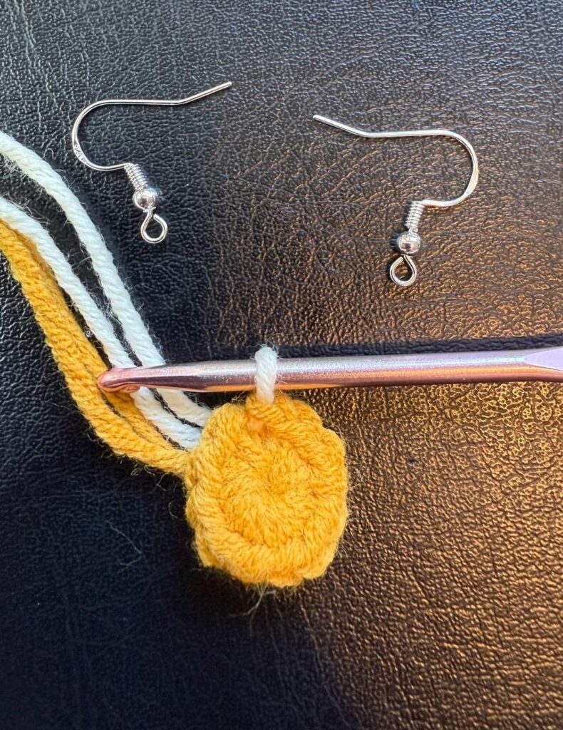 round one of the earrings