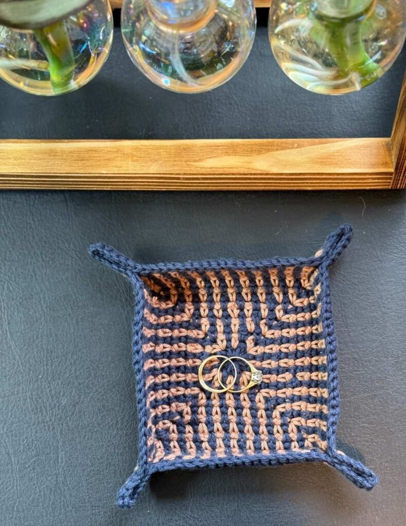 crochet trinket tray beside my propagator