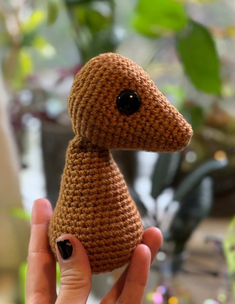 sewing the head onto the body