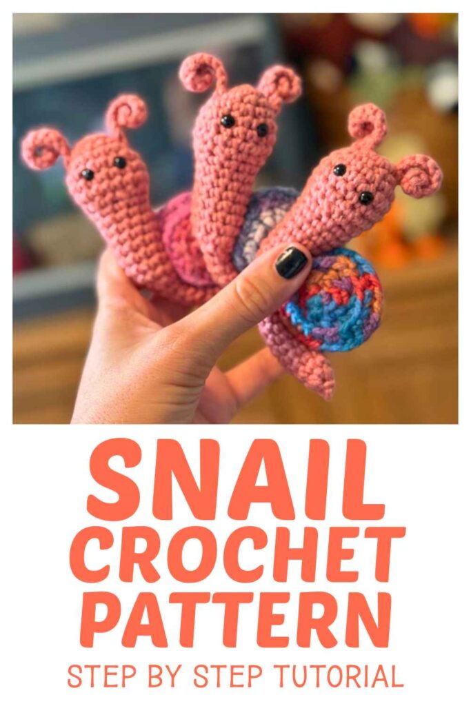 photo of tiny crochet snails