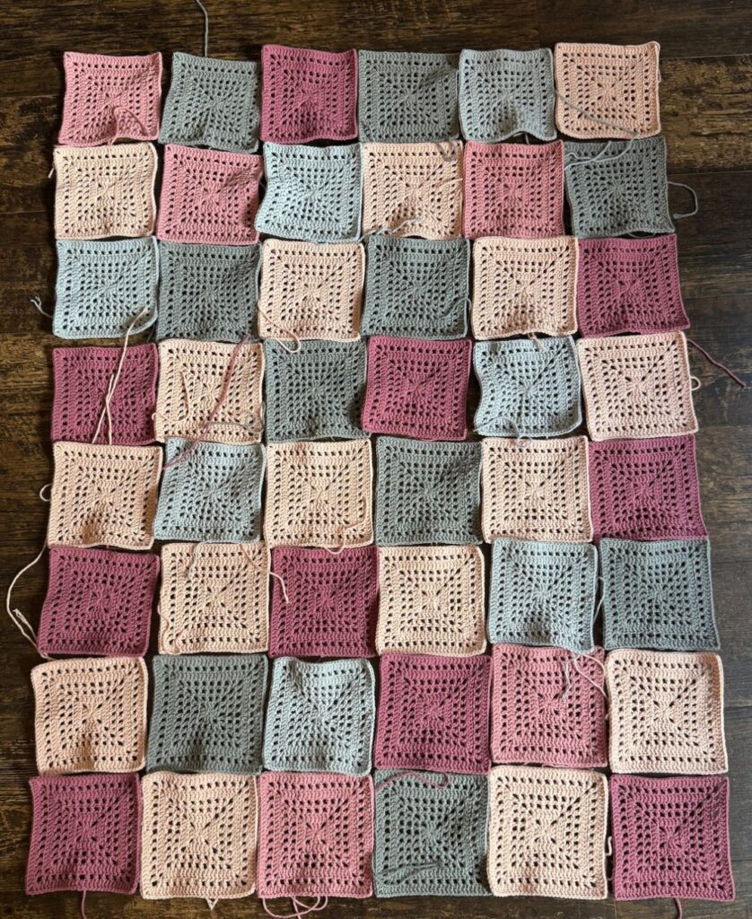 putting the pink blanket together