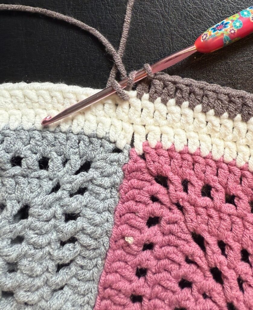 brown yarn addition to the border